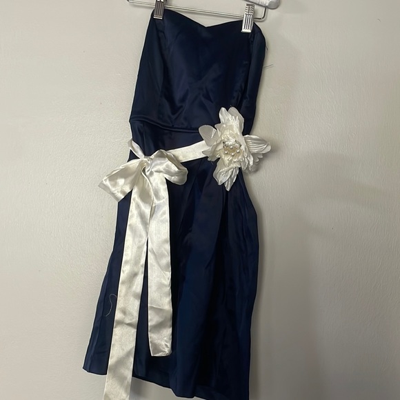 Trixxi Dresses & Skirts - Navy blue dress with white bow and pearl, rhinestone flower 🤍